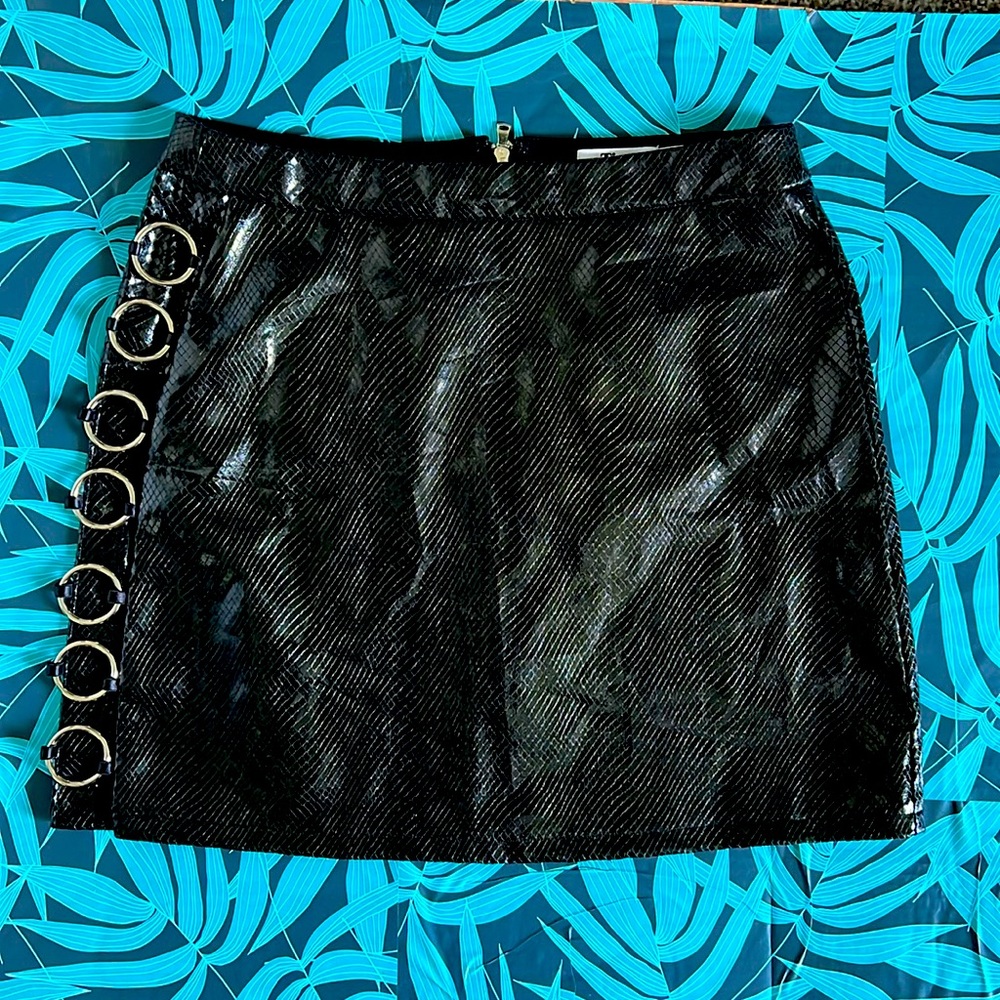 Tiger Mist size medium faux leather mini skirt with metal rings